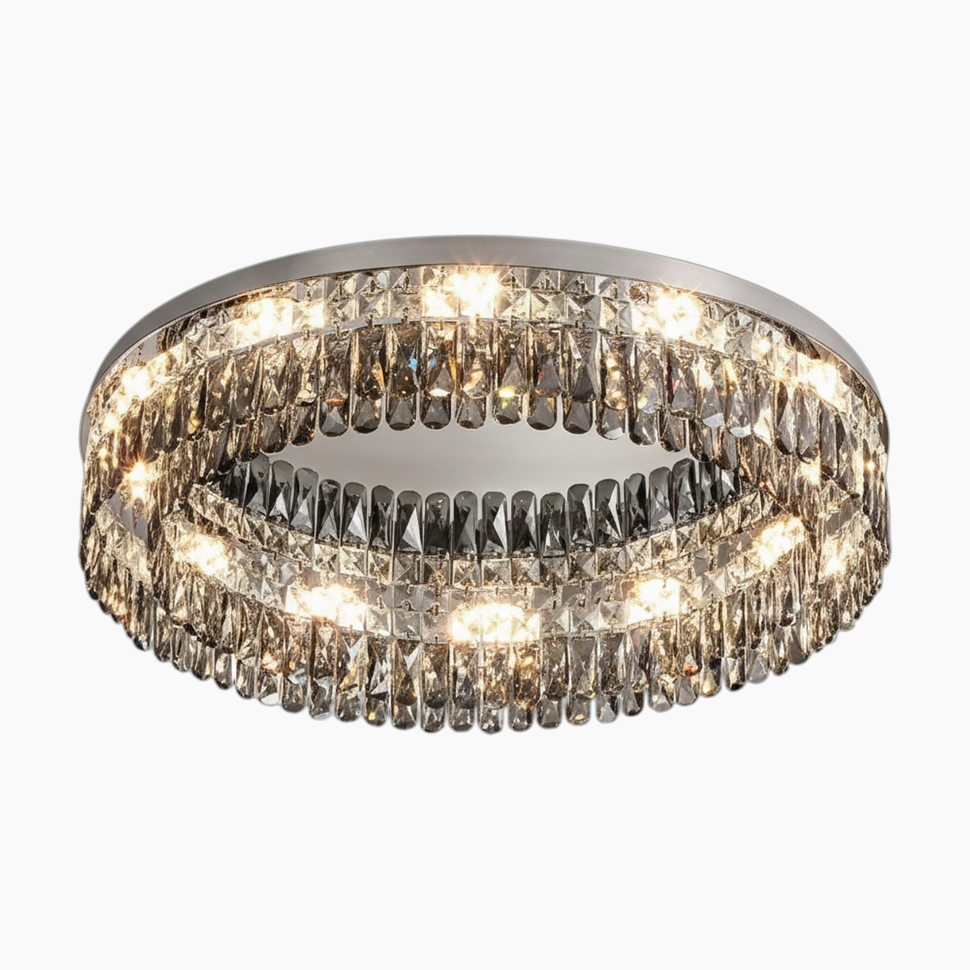 Modern LED chandelier with two concentric crystal rings, emits warm, sparkling light; elegant design.