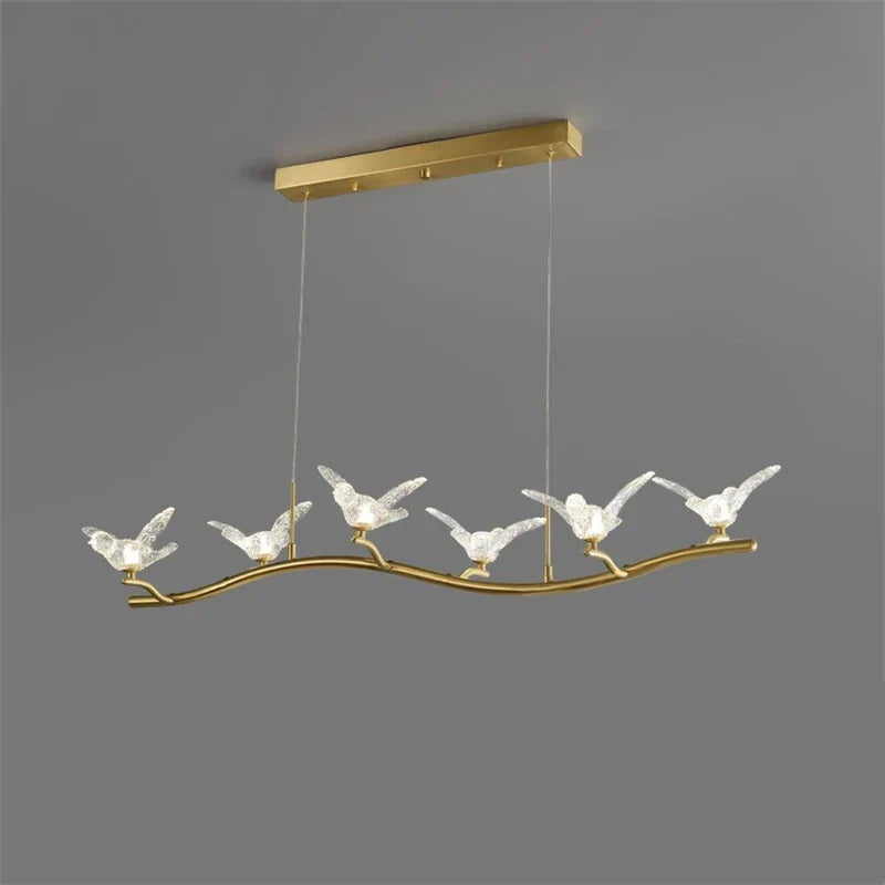Maison Ornate Golden Crystal Chandelier with gold branch frame and six glass bird-shaped LED lamps.