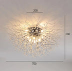 Elegant crystal branch LED chandelier with delicate metal arms and center bulbs, three sizes available.