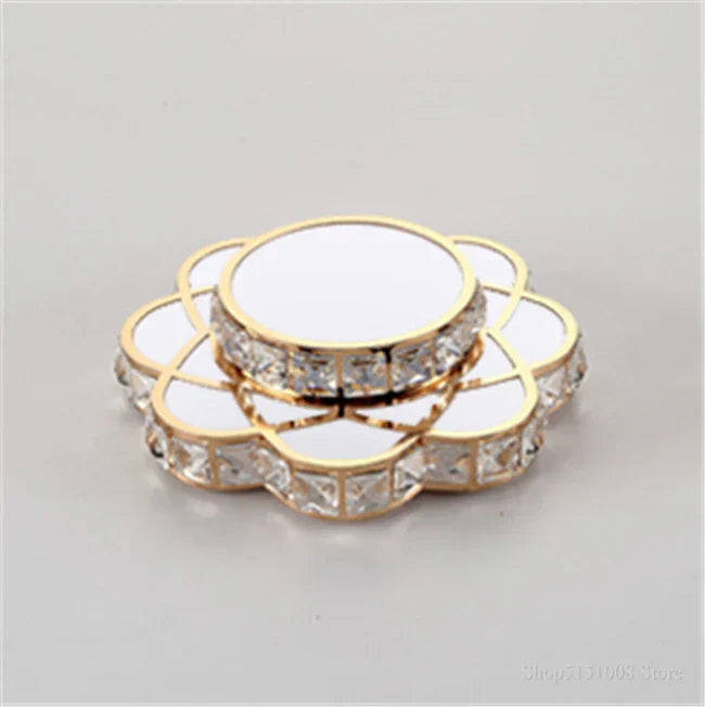 Maison Ornate Golden Crystal Floral Decorative LED chandelier with gold trim and clear gem accents.