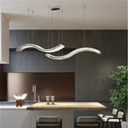 Pair of Maison Ornate Modern Crystal Chandeliers with sleek stainless steel bands, elegantly suspended.