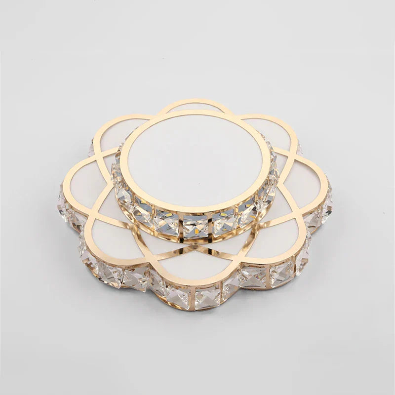 Round golden floral LED chandelier with mirrored design and crystal accents, elegant and ornate.