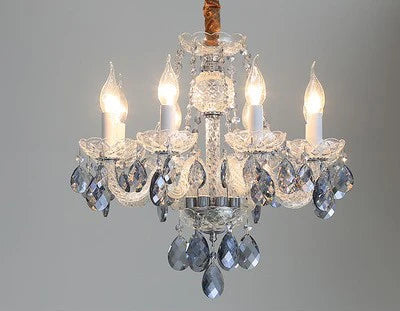 Lustre baroque en cristal aux nuances dorées pour intérieur élégant