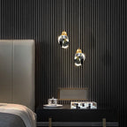 Two Maison Ornate Modern Minimalist Copper Crystal Chandeliers with sleek copper accents and sparkling crystal details.