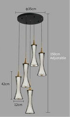 Modern LED crystal chandelier with five black and gold hourglass lamps, adjustable hanging length.