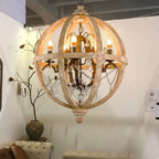 Maison Ornate Art Deco Crystal Chandelier with solid wood suspension, spherical shape, elegant crystal accents.