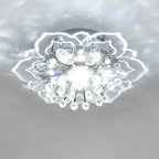 Art Deco-style crystal ball chandelier with colorful flowers and sparkling elements, elegant indoor lighting.