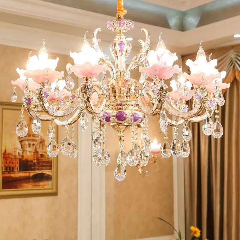 Maison Ornate Art Deco chandelier with gold, purple accents, pink flower shades, and hanging crystals.