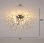 Ornate crystal-branch chandelier with slender metal arms, LED lights; 600mm wide, modern design.
