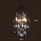 Art Deco chandelier with black iron birdcage frame, hanging crystals, and E14 LED bulbs.