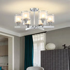 Maison Ornate Modern Glass Crystal Chandelier with five glowing cylindrical glass shades and elegant suspension.
