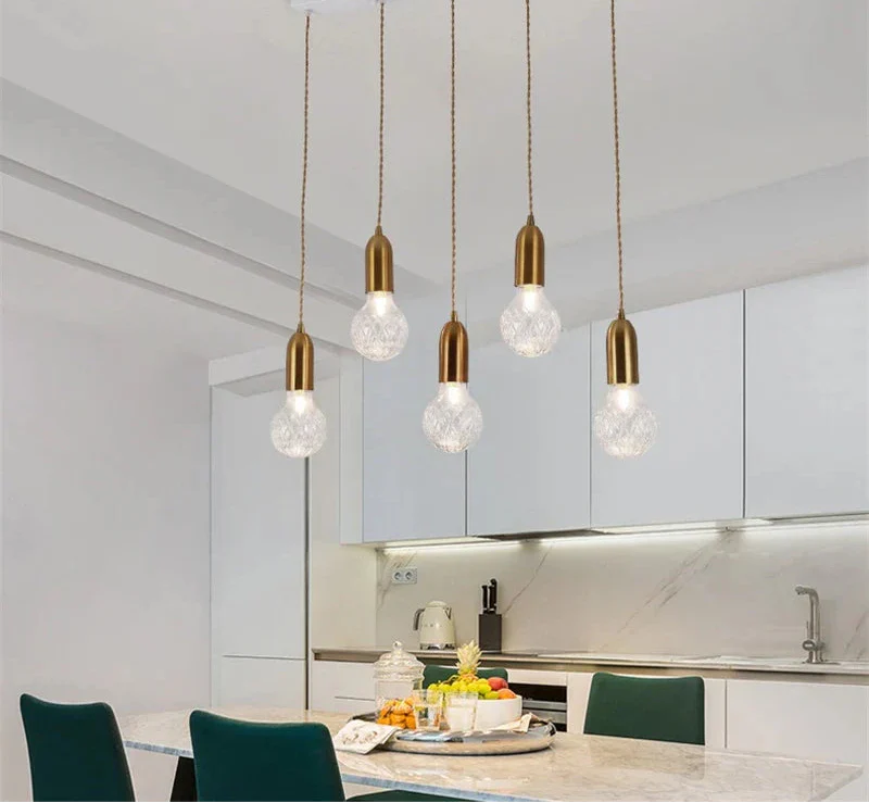 Five Maison ornate postmodern crystal LED glass chandeliers with gold bases and exposed bulbs.