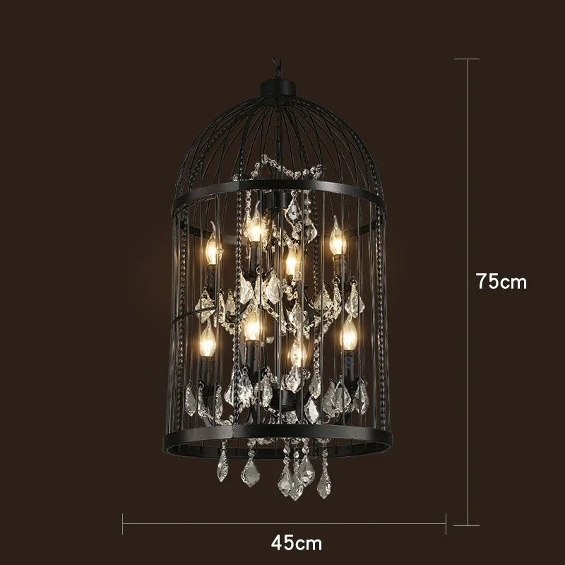 Art Deco crystal chandelier with black iron cage, exposed bulbs, and elegant hanging crystal accents.