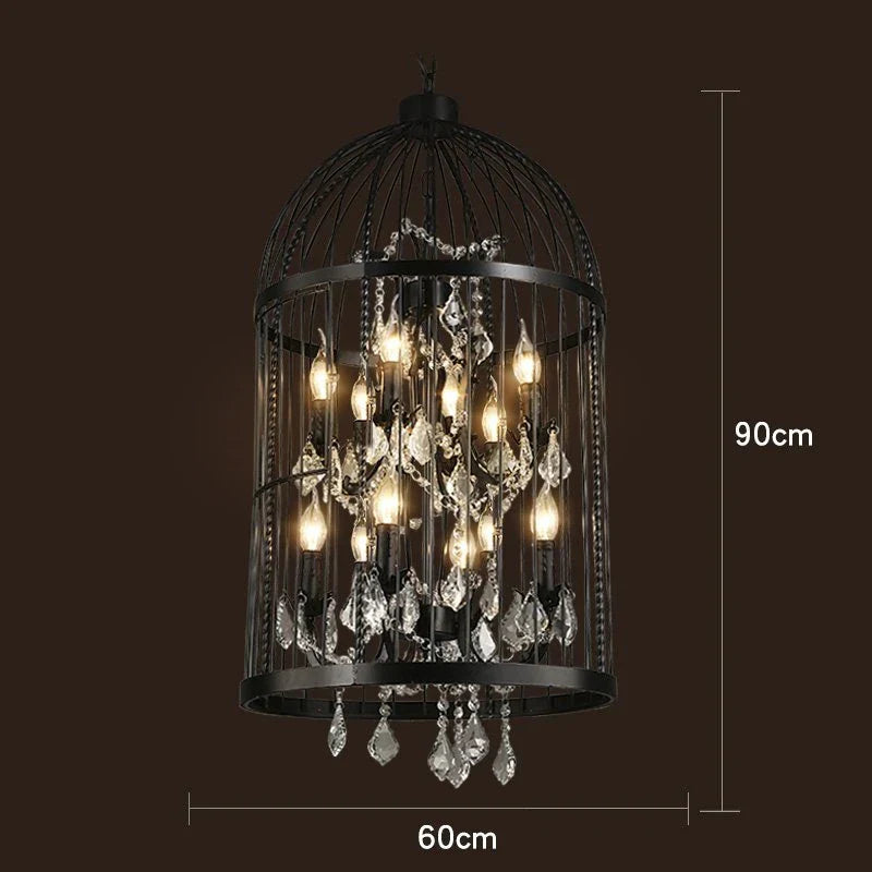 Maison Ornate Art Deco chandelier with black iron cage, exposed bulbs, and hanging crystals, 90x60 cm.