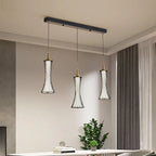 The Maison Ornate Modern LED Crystal Chandelier with three fluted glass shades, sleek fixture.