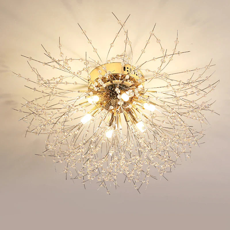 Ornate chandelier with gold branches and crystal beads, LED bulbs create a radiant starburst.