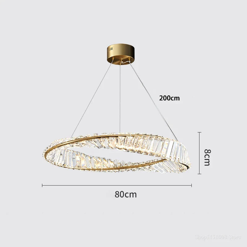 Gold-base modern crystal chandelier with hanging rings, integrated LED, 80cm wide, 8cm high.