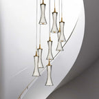 Eight-light modern chandelier with black wire frames, gold accents, and LED crystal pendants.