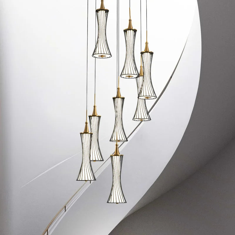Eight-light modern chandelier with black wire frames, gold accents, and LED crystal pendants.