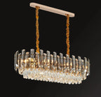 Maison Ornate Elegant Modern Crystal Pendant Light with gold accents and sparkling crystal drops.