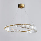 Maison Ornate Modern Chandelier with angular crystals on gold ring, suspended by three wires.