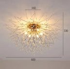 Gold starburst chandelier with crystal branches, LED bulbs; measures 600mm x 160mm x 330mm. Modern, elegant design.