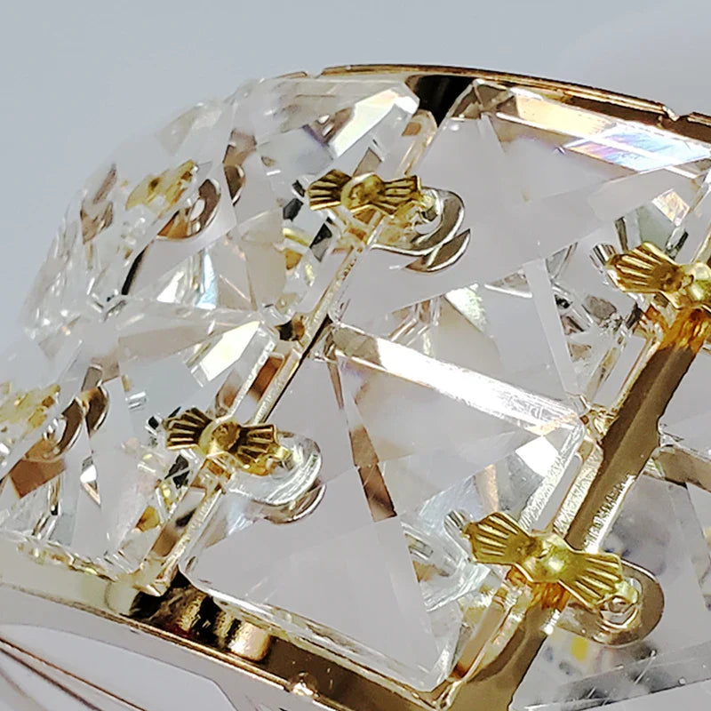 Maison Ornate Art Deco Crystal Chandelier with gold, black accents and geometric crystal detailing.