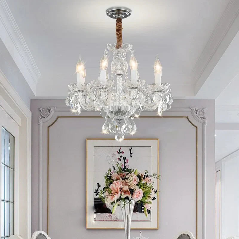 Maison Ornate Baroque crystal chandelier with golden accents, featuring intricate detailing and elegant crystals.