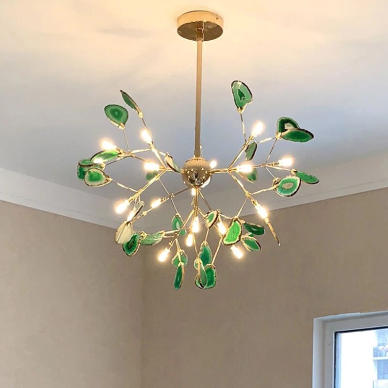 Maison Ornate Flower-Shaped Crystal LED Chandelier with gold branches and green crystal accents.