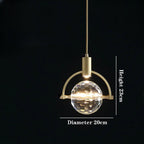 Gold and glass postmodern chandelier with faceted spherical shade, 23 cm tall, 20 cm wide.