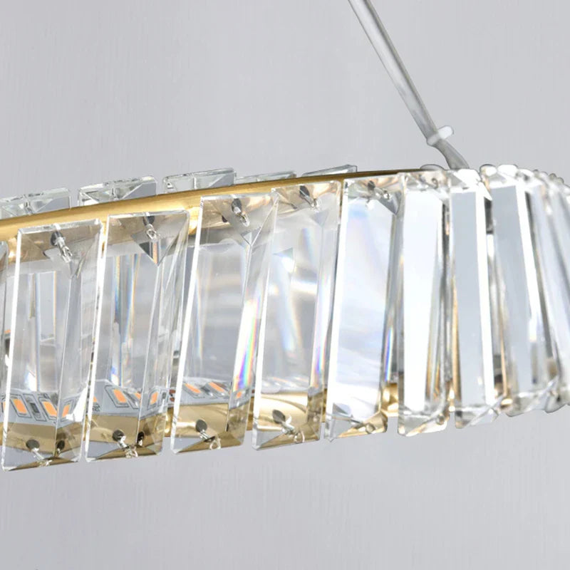 Maison Ornate Modern Crystal Chandelier with hanging rings, gold frame, clear rectangular crystal prisms.