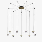 Eight geometric LED pendants hang from a circular mount in this modern crystal spider chandelier.