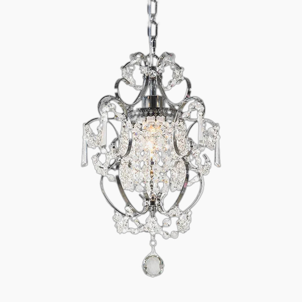 Sparkling crystal chandelier with silver metalwork, chain suspension, and a single decorative tassel.