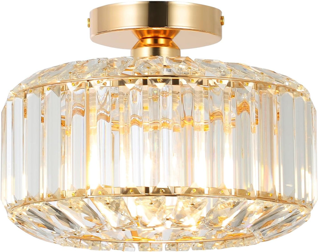 Gold-frame chandelier with clear crystal prisms, E27 base, glass shade, elegant and modern.