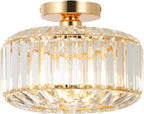 Gold-frame chandelier with clear crystal prisms, E27 base, glass shade, elegant and modern.