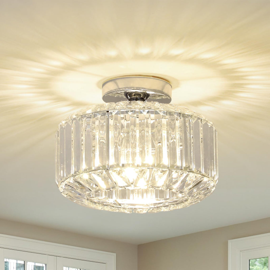 Maison Ornate Modern Crystal Chandelier with round glass shade and E27 base, emits bright decorative light.