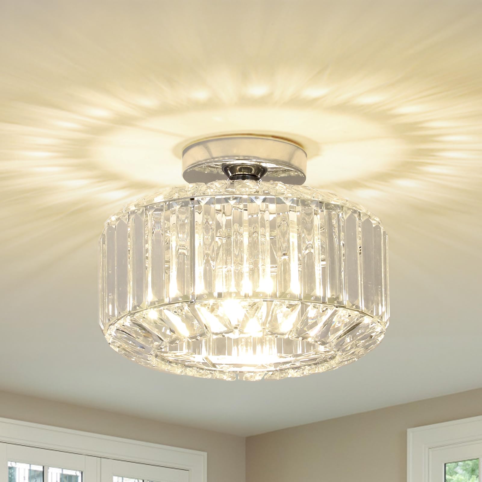 Maison Ornate Modern Crystal Chandelier with round glass shade and E27 base, emits bright decorative light.