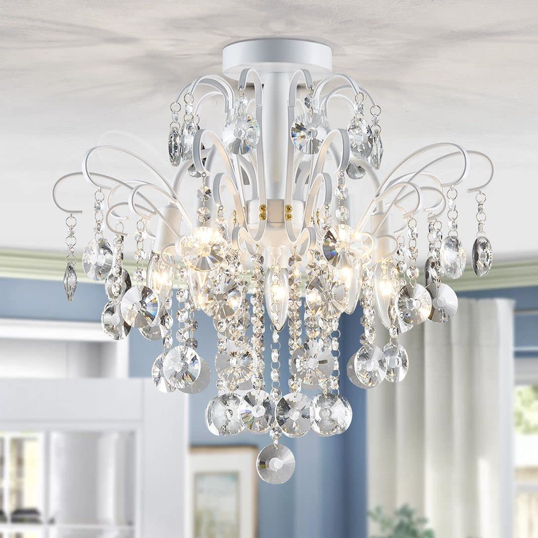 Elegant alloy steel chandelier with curved arms and crystals, casting a warm, inviting glow.