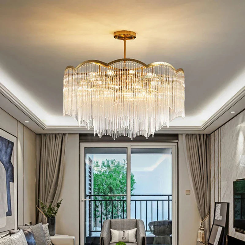 Maison Ornate Elegant Modern Crystal Pendant Light, gold-framed and LED-lit, elegantly suspended from ceiling.