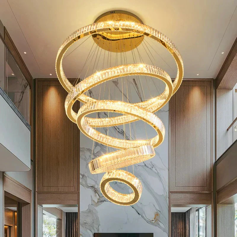 Maison Ornate Modern Crystal Chandelier with spiral illuminated rings; dimmable, elegant crystal design.