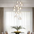 Maison Ornate Modern LED Crystal Icicle chandelier featuring cascading crystals and sleek metal detailing.