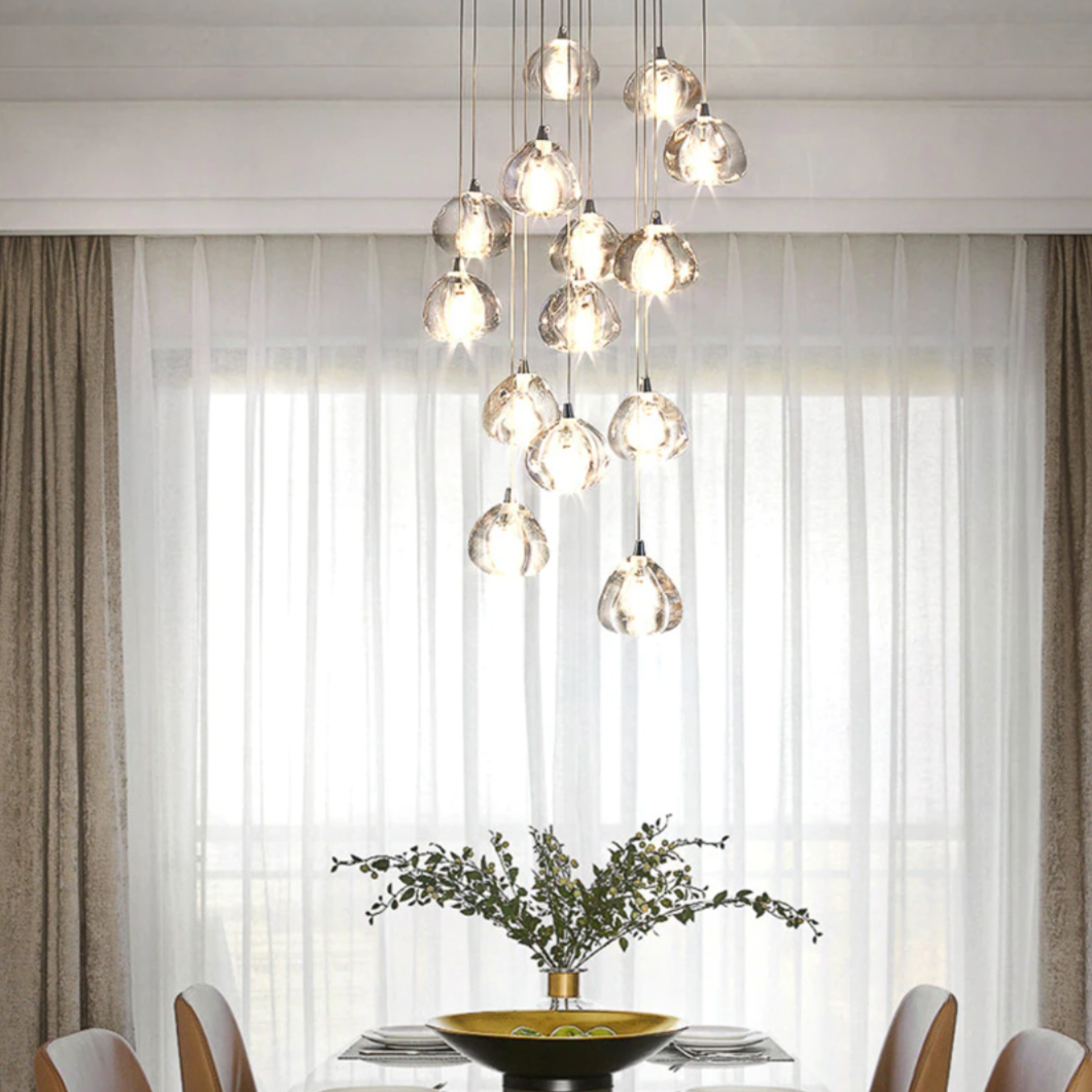 Maison Ornate Modern LED Crystal Icicle chandelier featuring cascading crystals and sleek metal detailing.