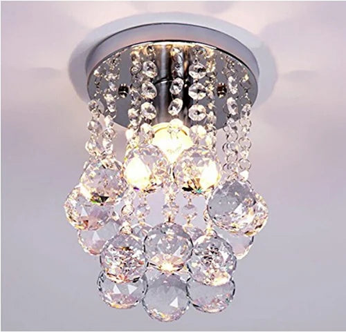 Maison Ornate Modern Crystal Pendant Light with tassels, featuring crystal beads and pendants. Sparkling chandelier design.