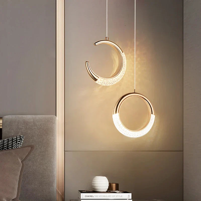 Modern Crystal Chandelier with gold accents, soft LED-compatible glow highlights elegant fixture design.