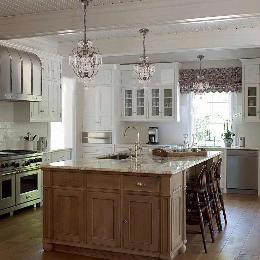 Maison Ornate Modern Crystal Chandelier with loft tassels, elegant lighting fixture above the kitchen sink.
