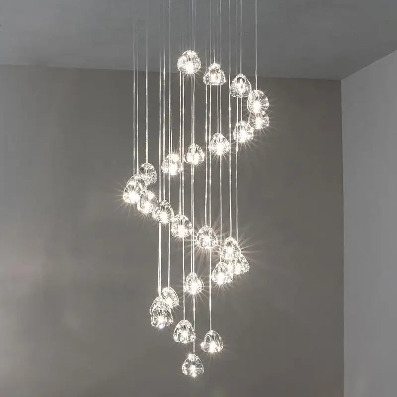 Elegant spiral chandelier with glass crystal spheres and bright LEDs, modern long-shape design.