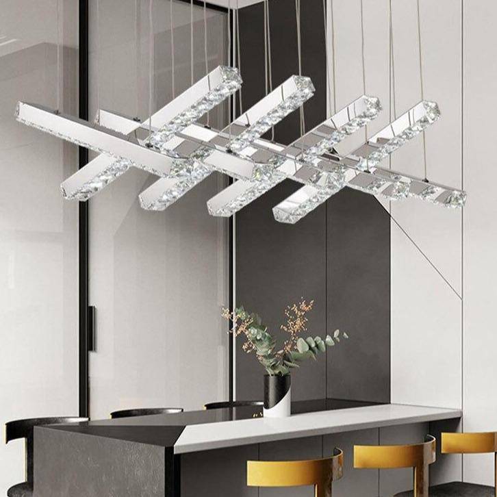 Maison Ornate Luxury Modern Crystal Chandelier with glass tassels and LED lighting overhead.