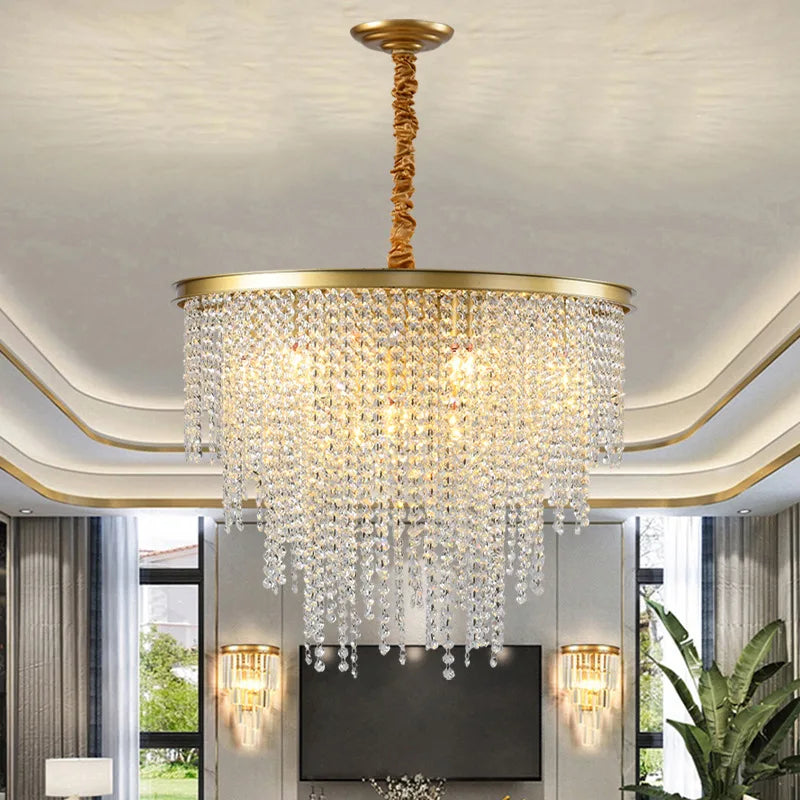 Maison Ornate Modern Crystal Chandelier with gold chain, featuring sparkling crystals and sleek gold accents.