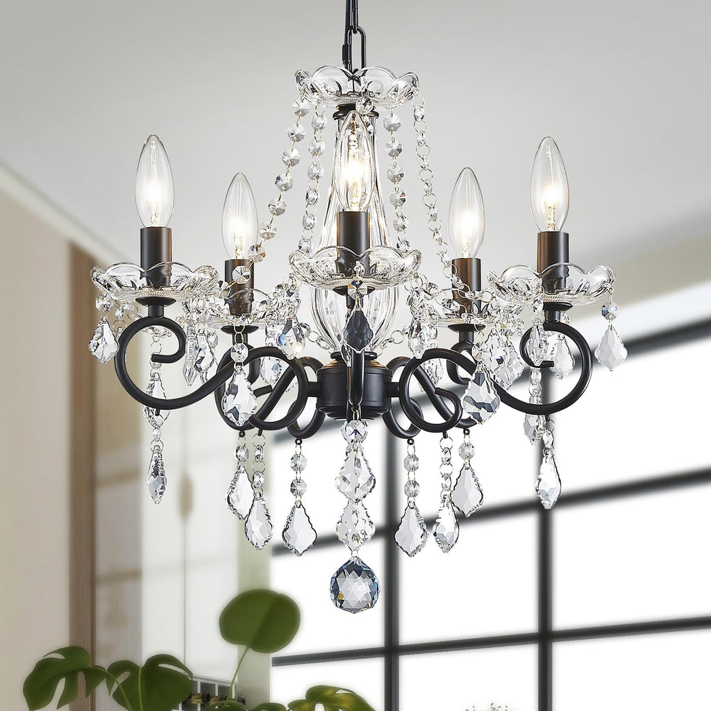 Modern metal chandelier with five candle-style lights, crystal pendants, and sparkling bead details.