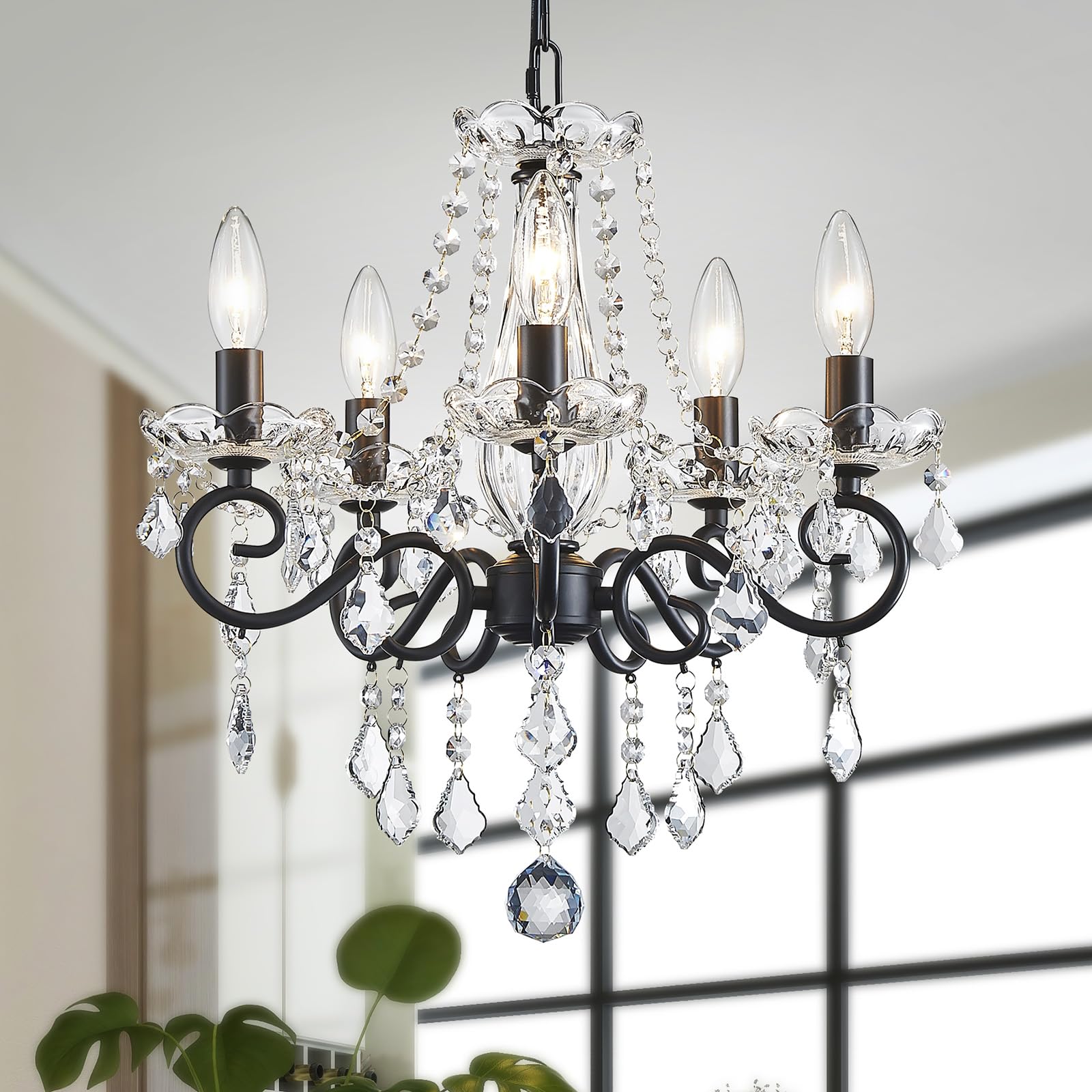 Modern metal chandelier with five candle-style lights, crystal pendants, and sparkling bead details.